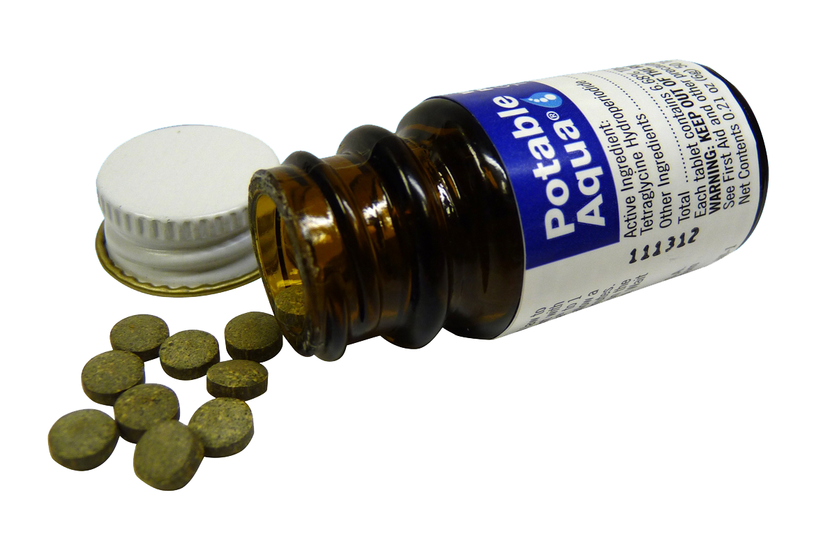Potable Aqua water purification tablets spilled on surface
